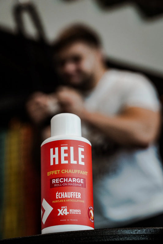 Recharge 200 ml du roll-on massage Échauffer HELE Sport au premier plan, sportif flou en arrière-plan