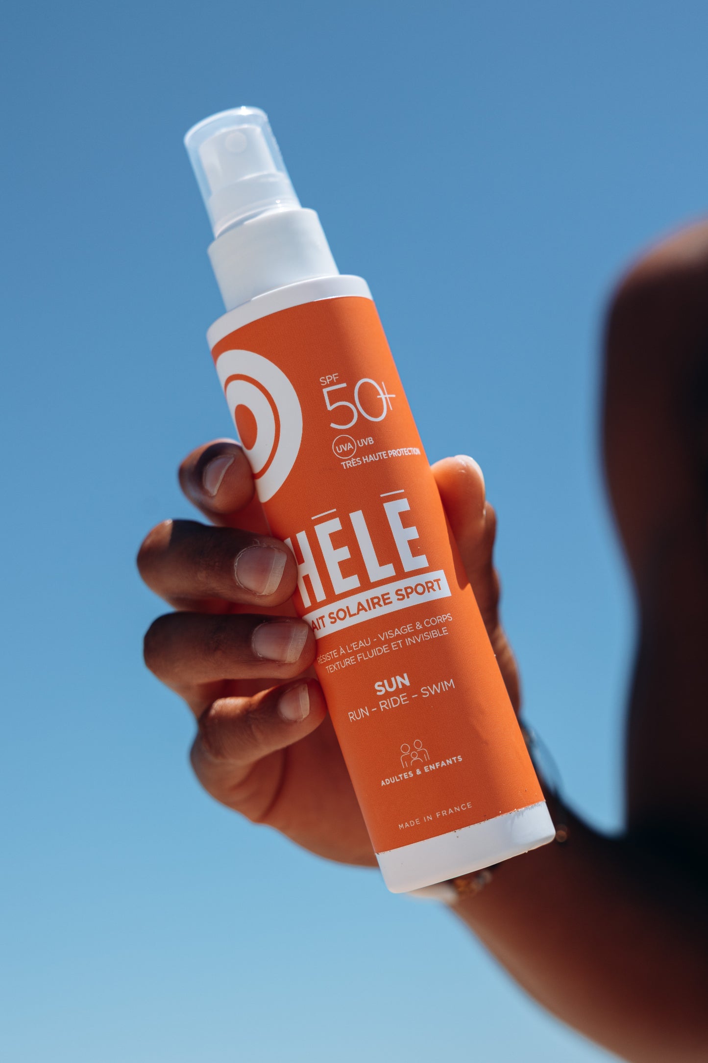 Lait solaire sport SPF50+ texture fluide invisible — visage & corps