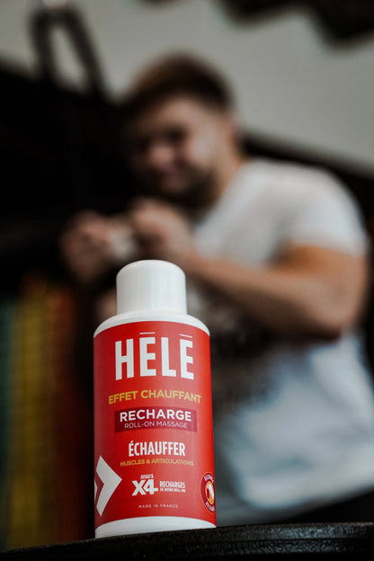 Recharge 200 ml du roll-on massage Échauffer HELE Sport au premier plan, sportif flou en arrière-plan