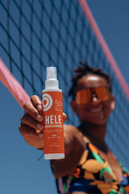 Huile solaire sport SPF50+ texture sèche — visage & corps
